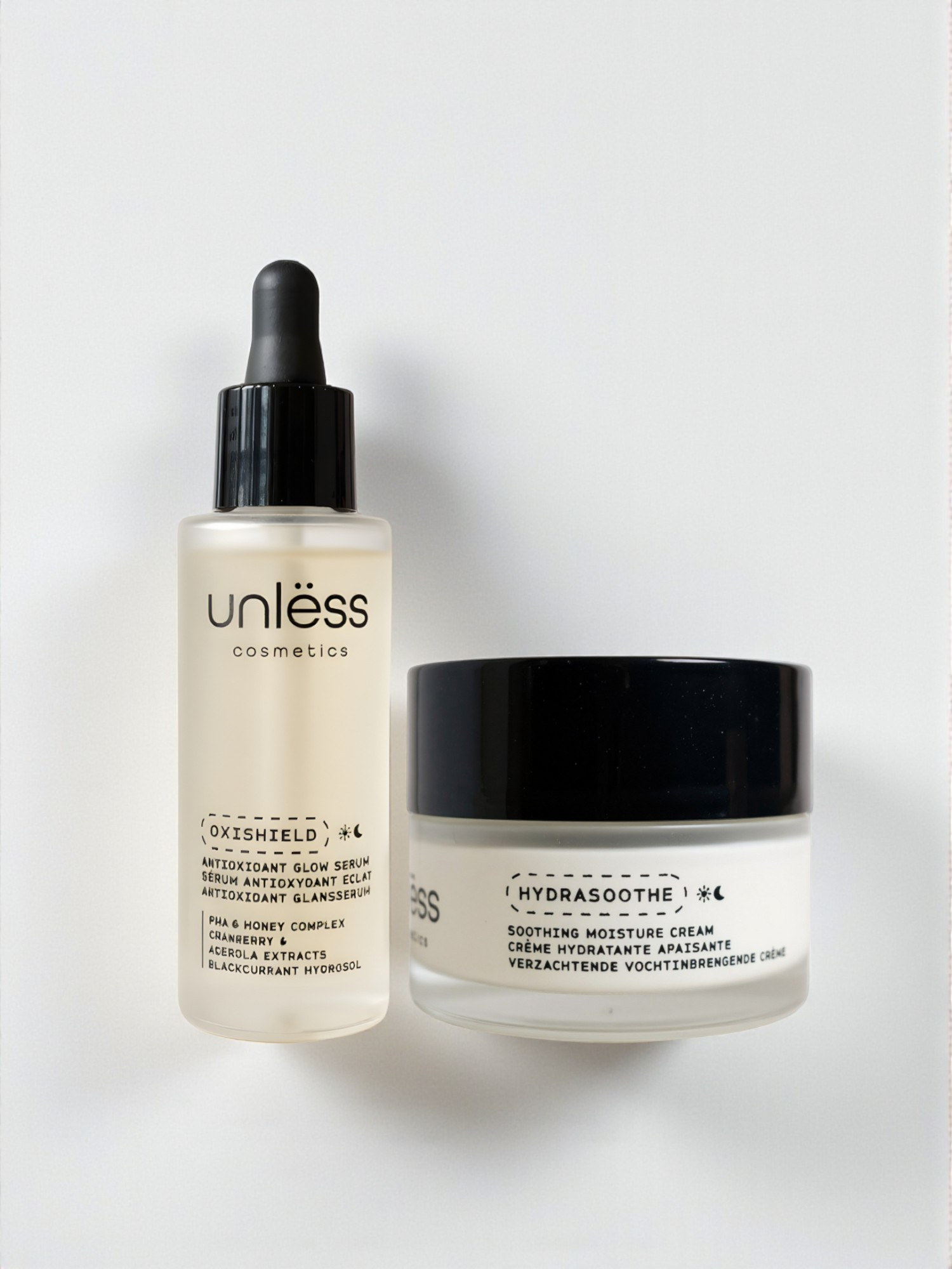 Duo Peau Éclatante d’Unlëss Cosmetics composé du sérum OxiShield et de la crème Hydrasoothe présentés ensemble sur fond neutre.